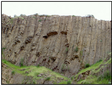 This is a series of 3 pictures that show a feature called columnar jointing. This is closer.