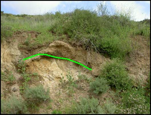 This is the first of two pictures showing the gray fine grained unit as a flow over the top of the tan coarse grained unit.This is at a distance.