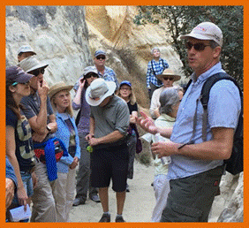 Title: Keith Meldahl and students - Description: Keith Meldahl describing geology to students on a field trip